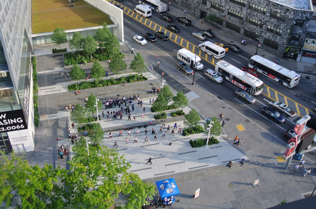 Aerial shot of BAM Plaza with people doing exercise.